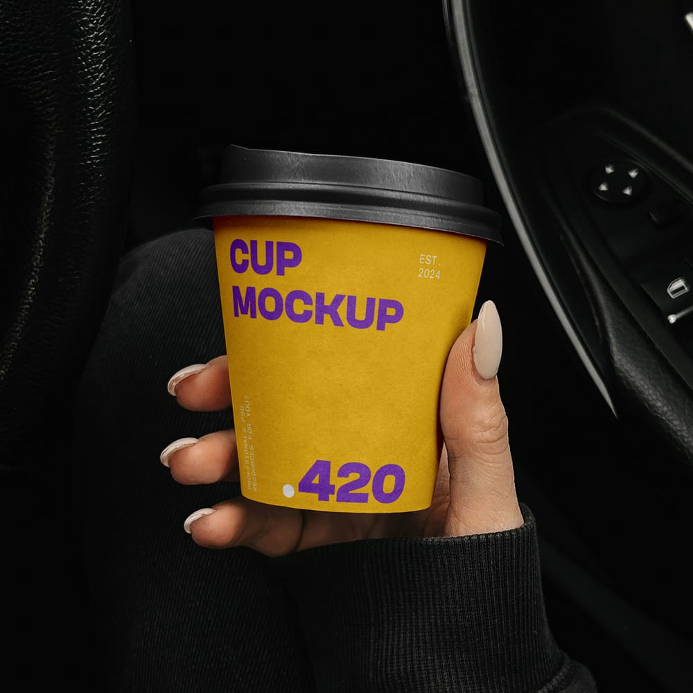 Free Paper Coffee Cup in the Car Mockup PSD