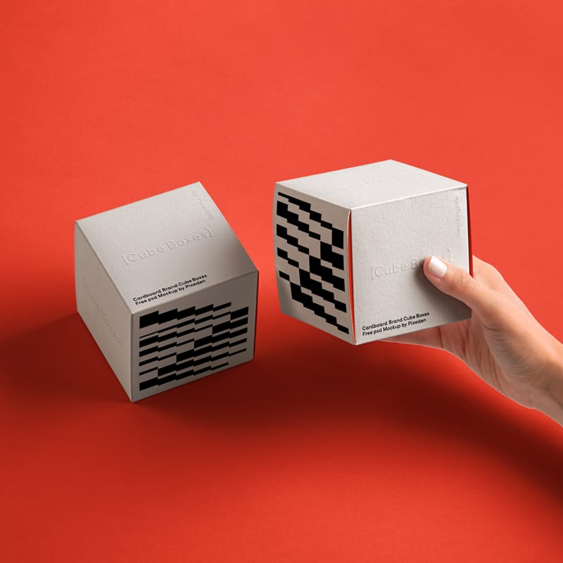 Hand Holding Square Mockup Boxes PSD