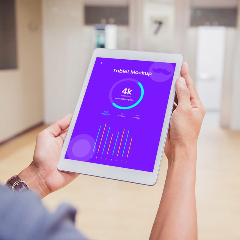 Tab in Men's Hand Mockup PSD