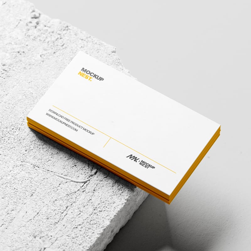 Business Card Mockup Stacked On Concrete PSD