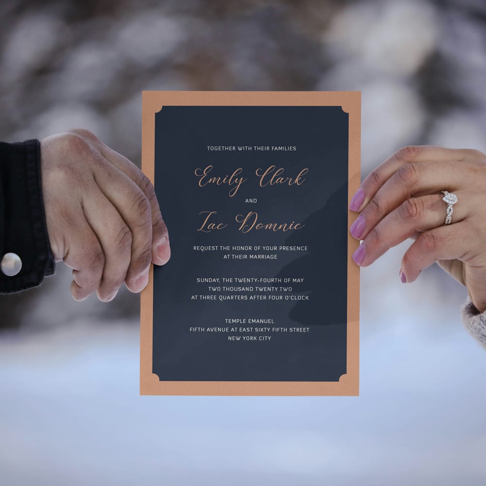 Free Couple Holding Wedding Invitation Card Mockup PSD