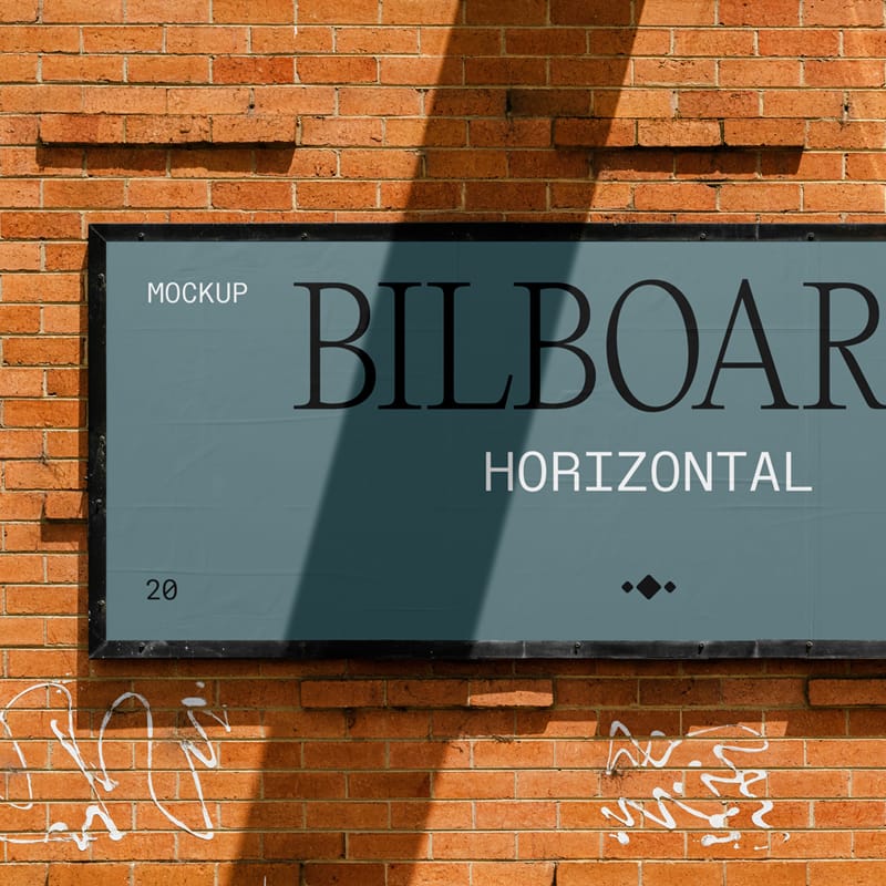 Small Billboard on Brick Wall Mockup PSD