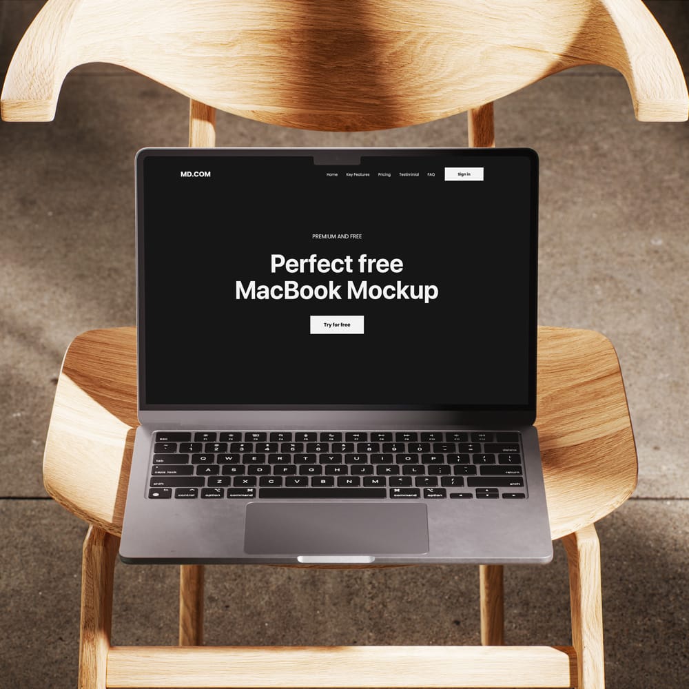 Free MacBook Mockup on Wooden Chair PSD