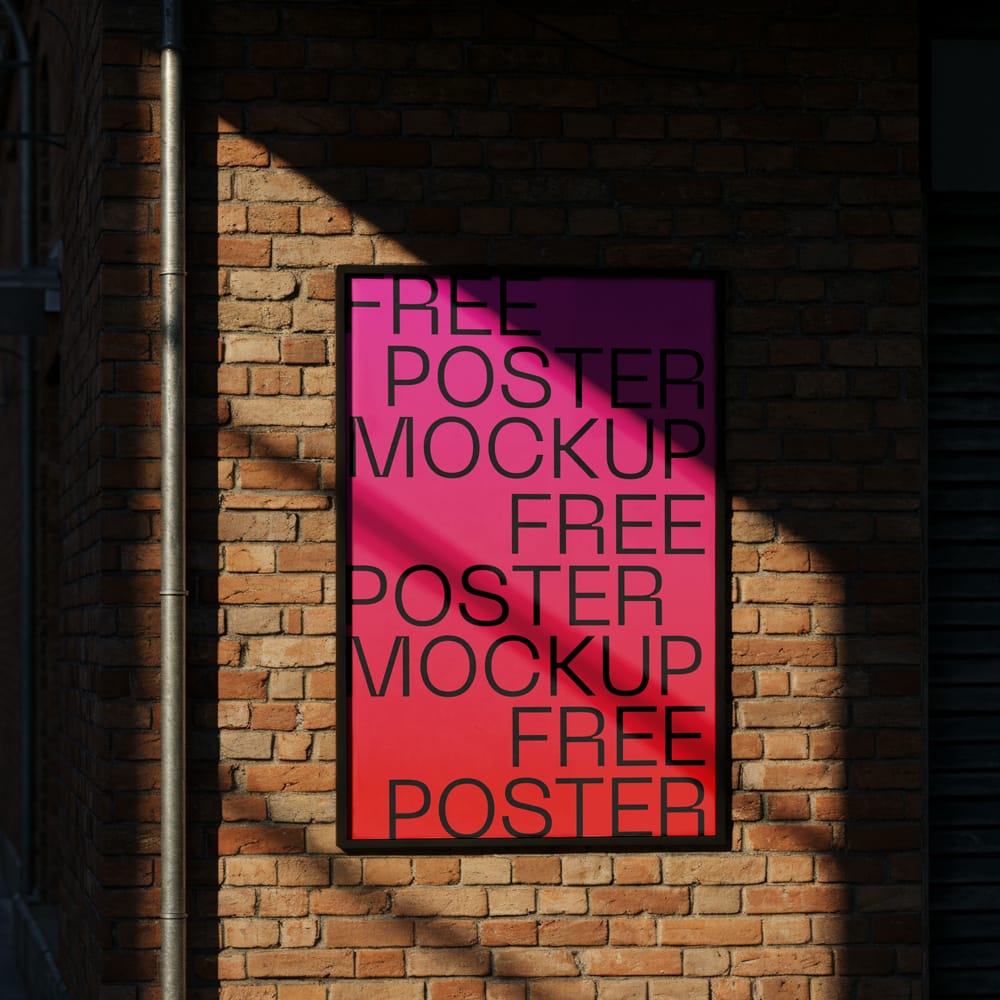 Free Poster Mockup on a Brick Wall PSD