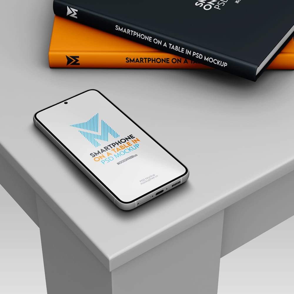 Free Smartphone On A Table in Mockup PSD