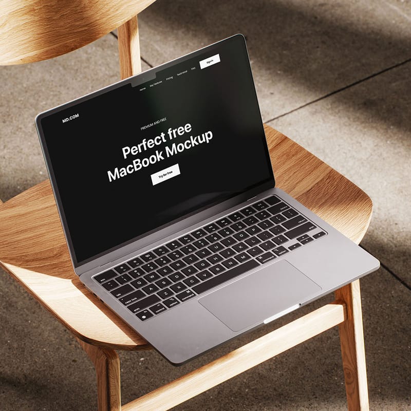 MacBook Mockup on Wooden Chair PSD
