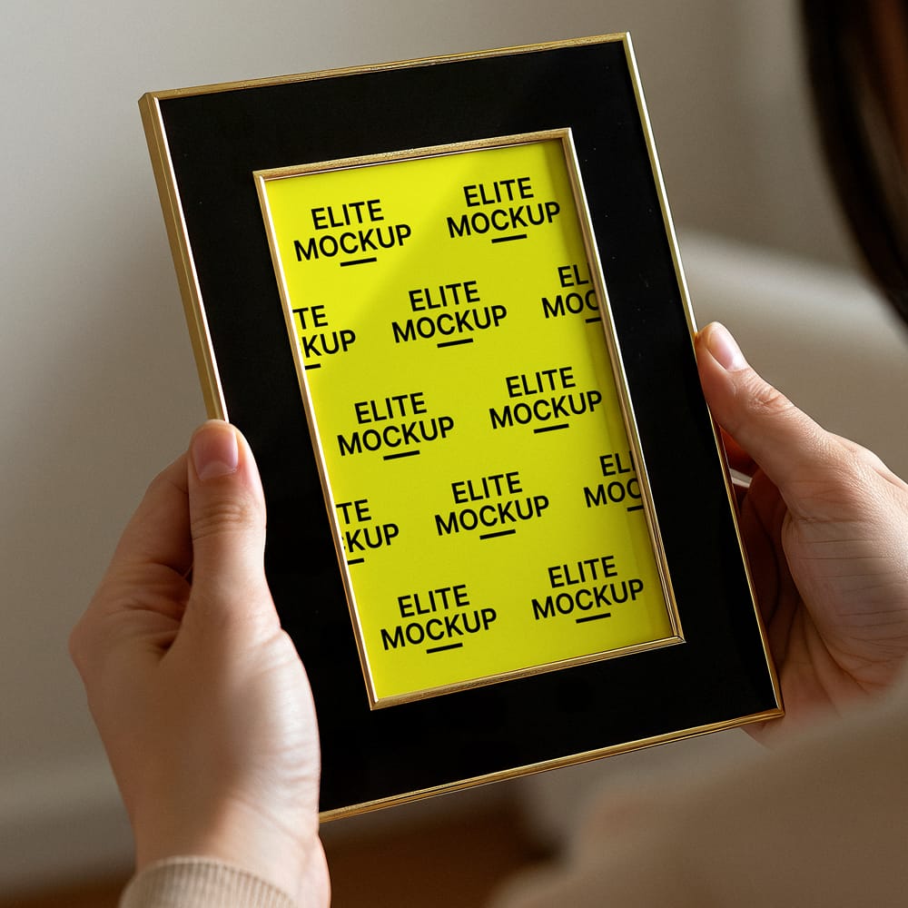 Woman Holding a Portrait Frame Mockup PSD