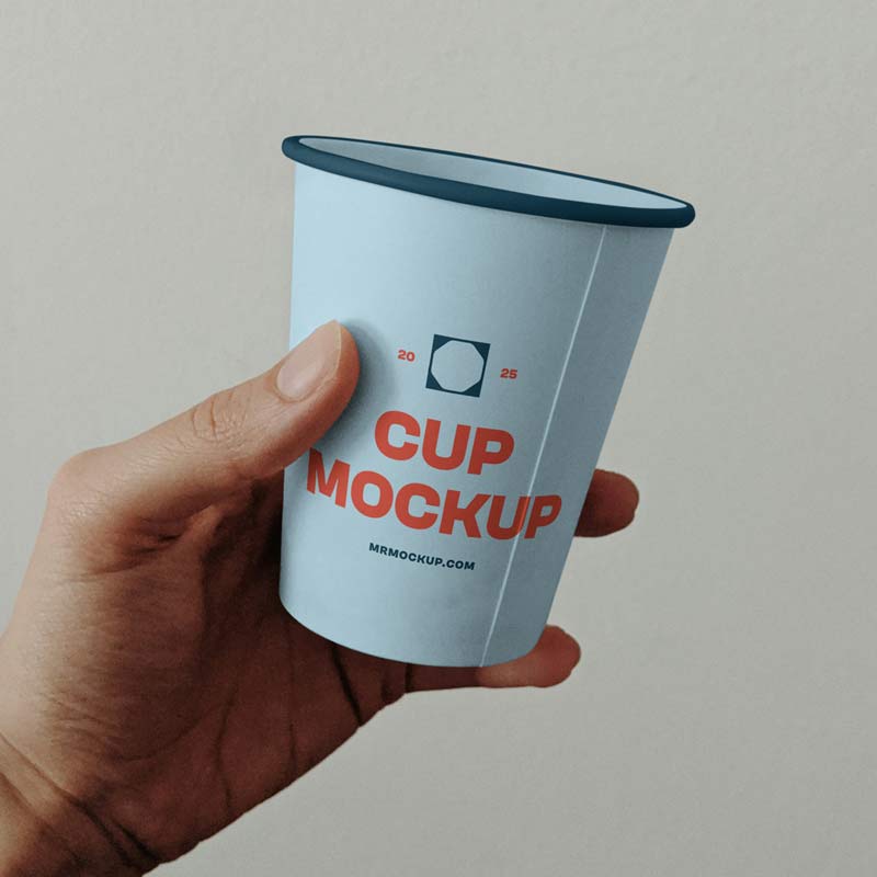 Paper Coffee Cup in Hand Mockup PSD