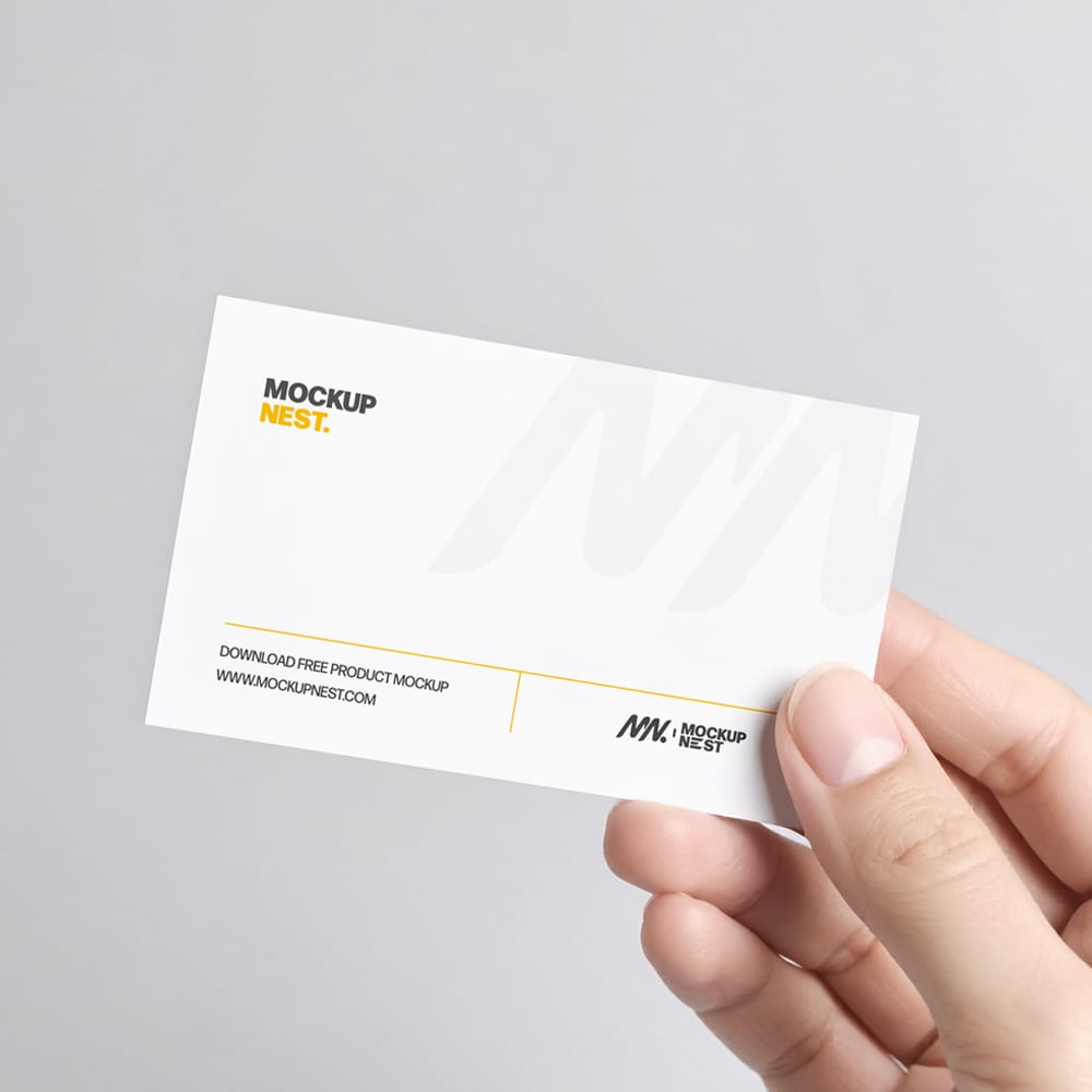 Free Business Card Holding By Hand Mockup PSD