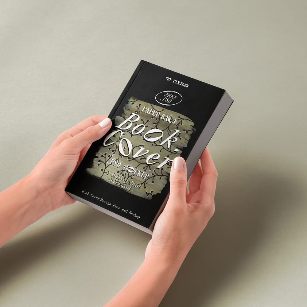 Free Hands Holding Paperback Book Cover Design Mockup PSD