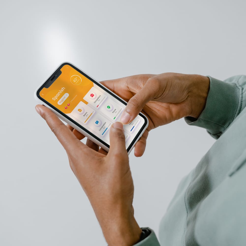 Free Holding an iPhone Mockup PSD