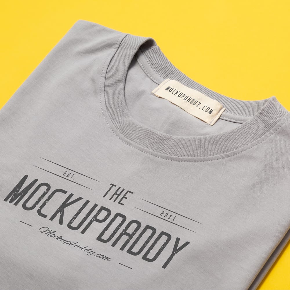 Free Realistic Folded Tee Mockup PSD