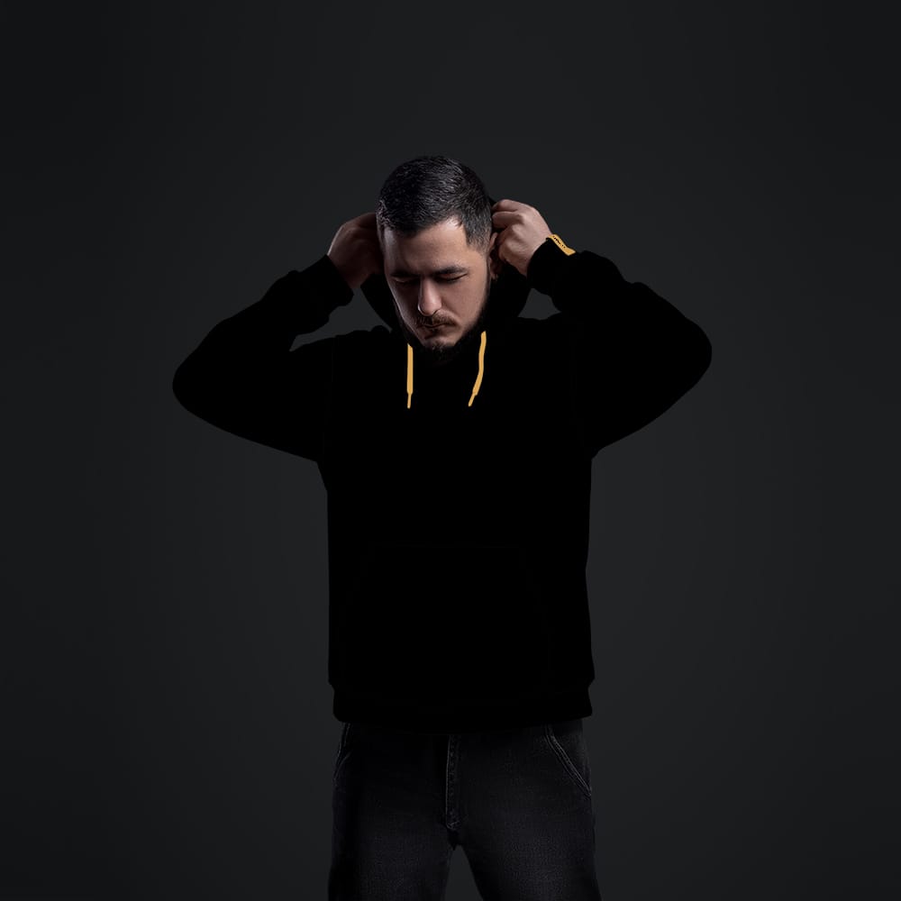 Man Wearing Oversize Hoodie Mockup PSD