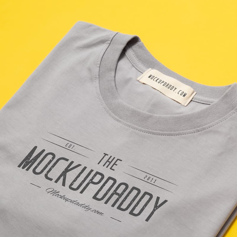 Realistic Folded Tee Mockup PSD
