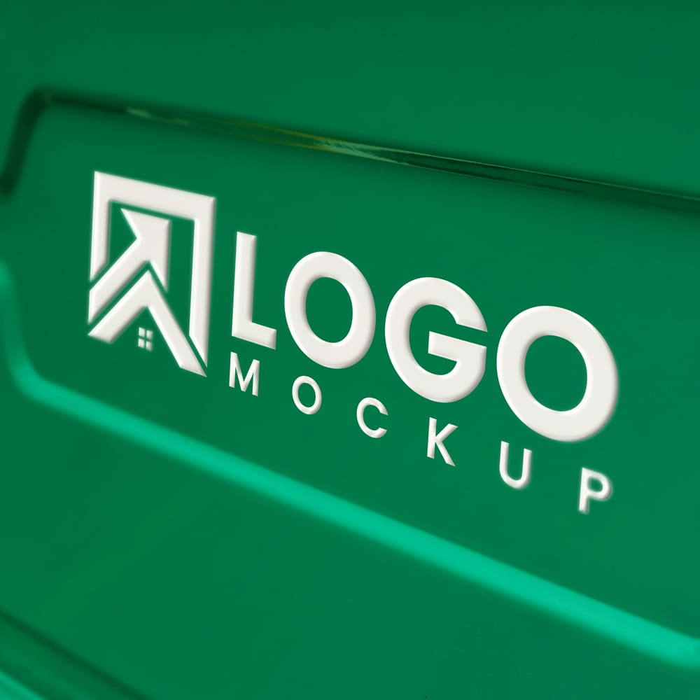 Free White Logo Mockup on Green Background PSD