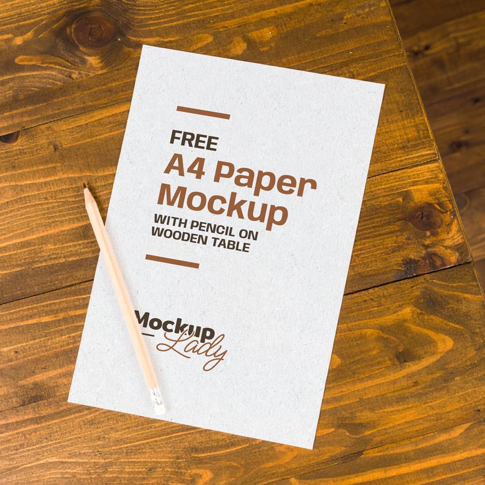 Free A4 Paper Mockup with Pencil on Wooden Table PSD