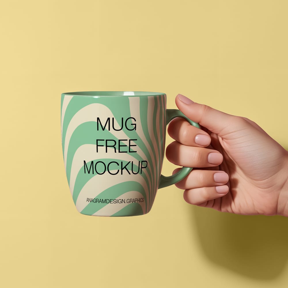 Free Hand Holding Coffee Mug Mockup PSD
