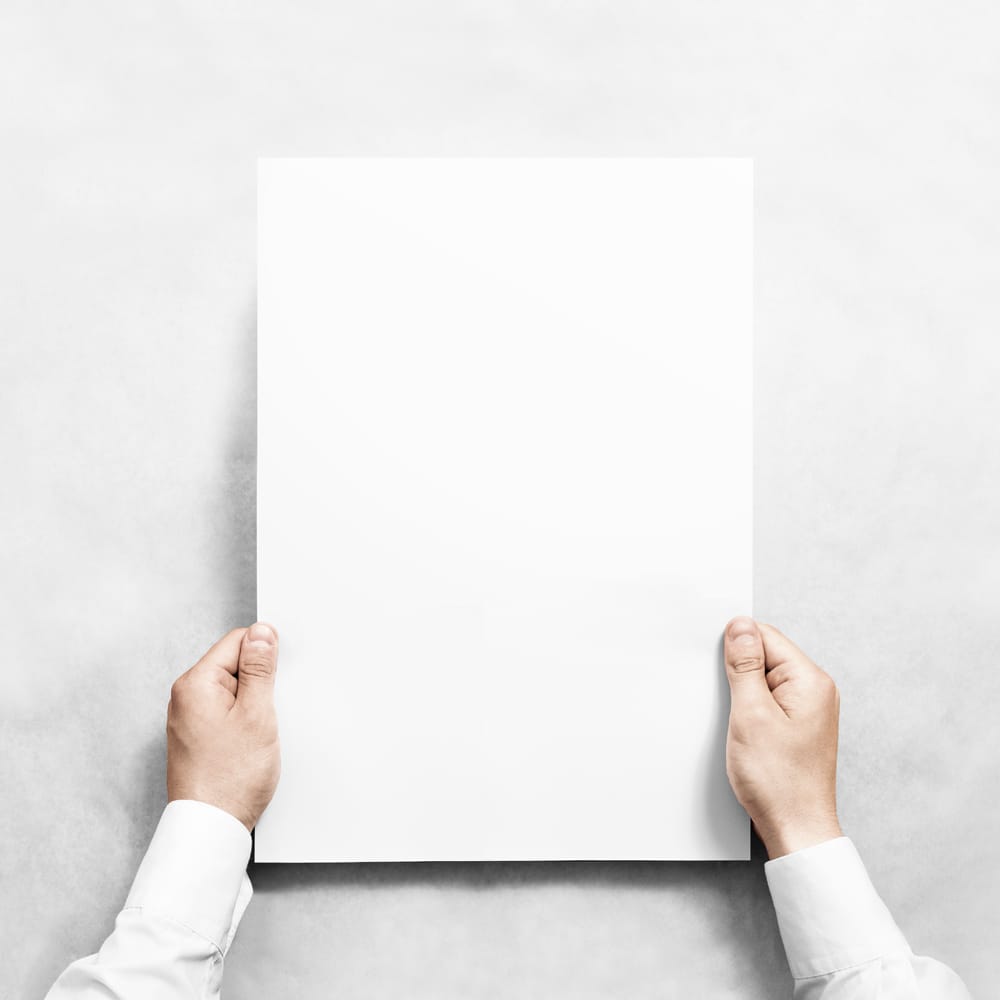 Free Hands Holding Poster Mockup PSD