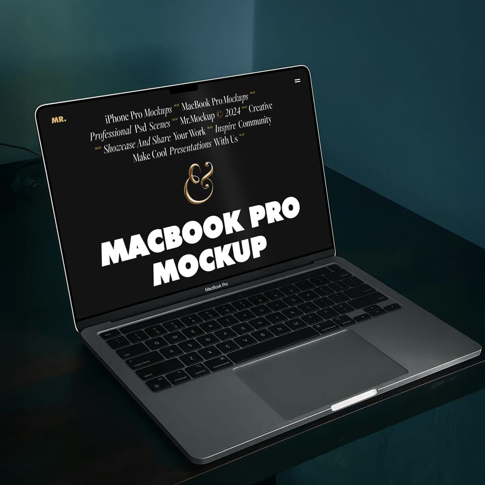 Free MacBook Pro on Black Table Mockup Template PSD