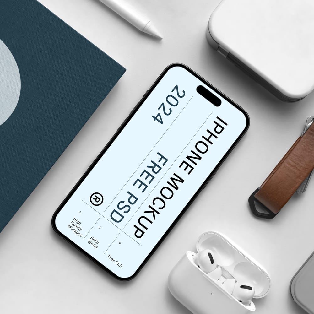 Free iPhone Pro with Book Mockup PSD