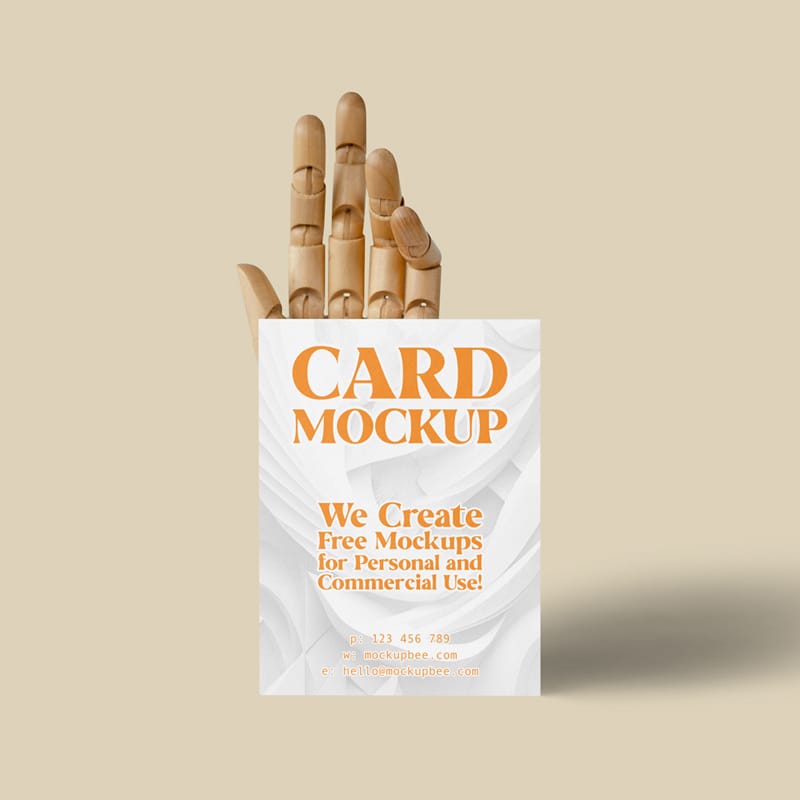 Card with Wooden Hand Mockup PSD