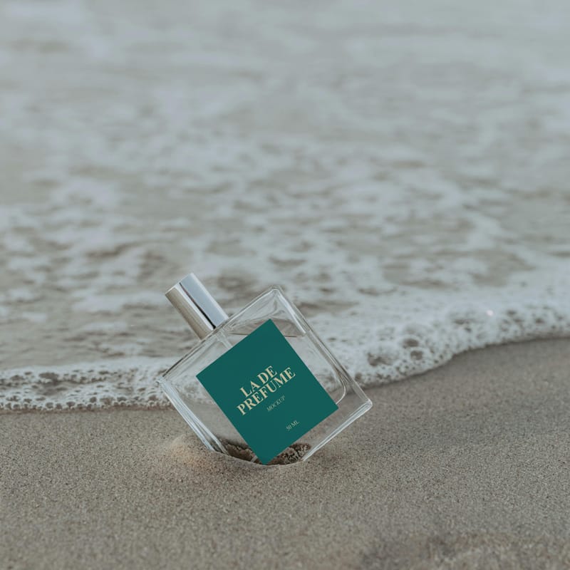 Cosmetic Perfume Mockup at the Beach PSD