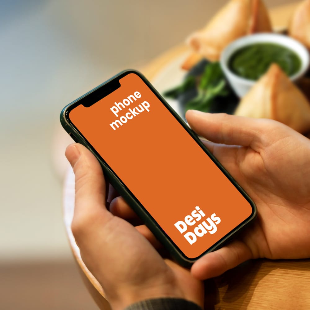 Free Man with Phone Mockup and Snacks PSD