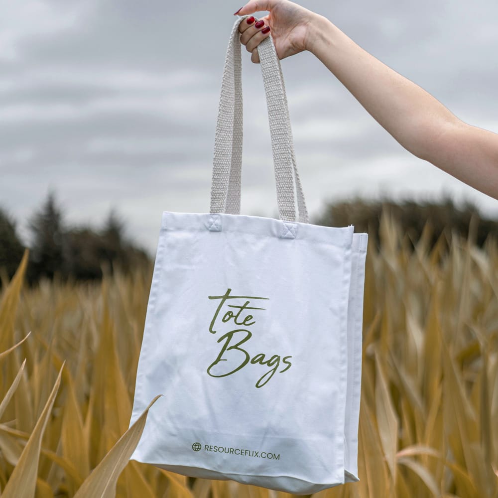 Free Realistic Tote Bag Mockup in Hand PSD