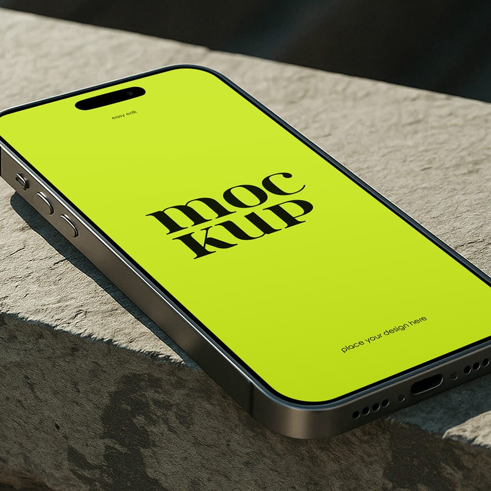 Free Realistic iPhone on Rock Mockup PSD