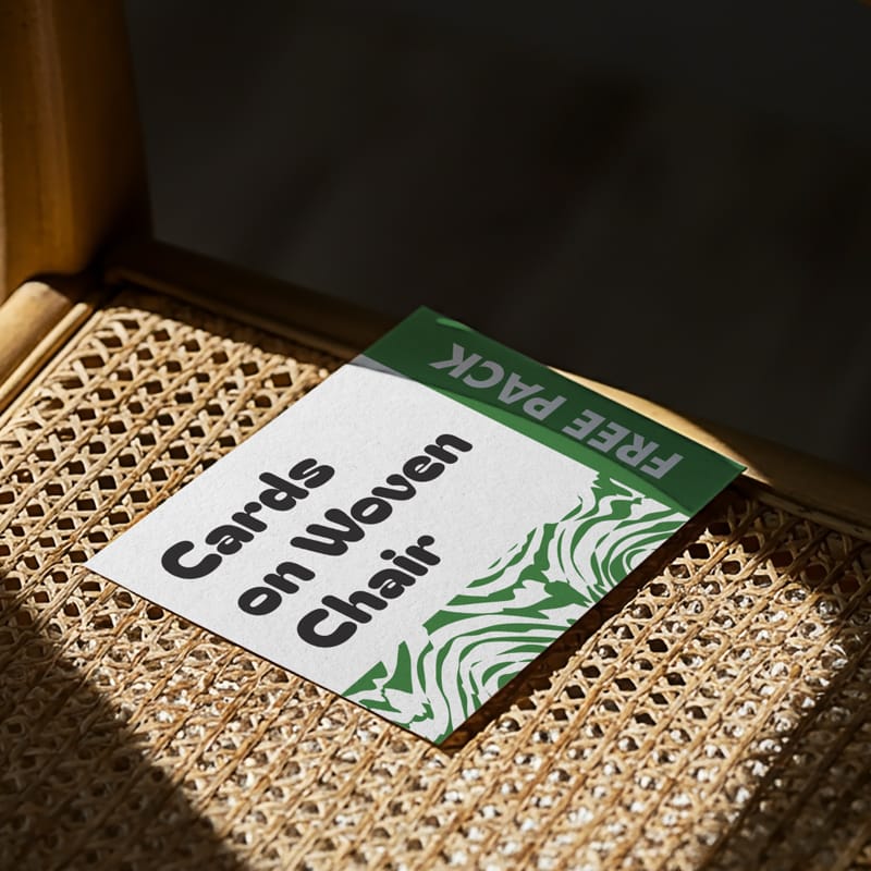 Pack Cards on Woven Chair Mockup PSD