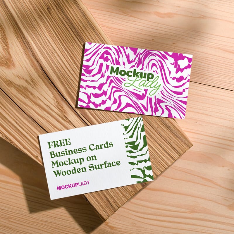 Business Cards Mockup on Wooden Surface PSD