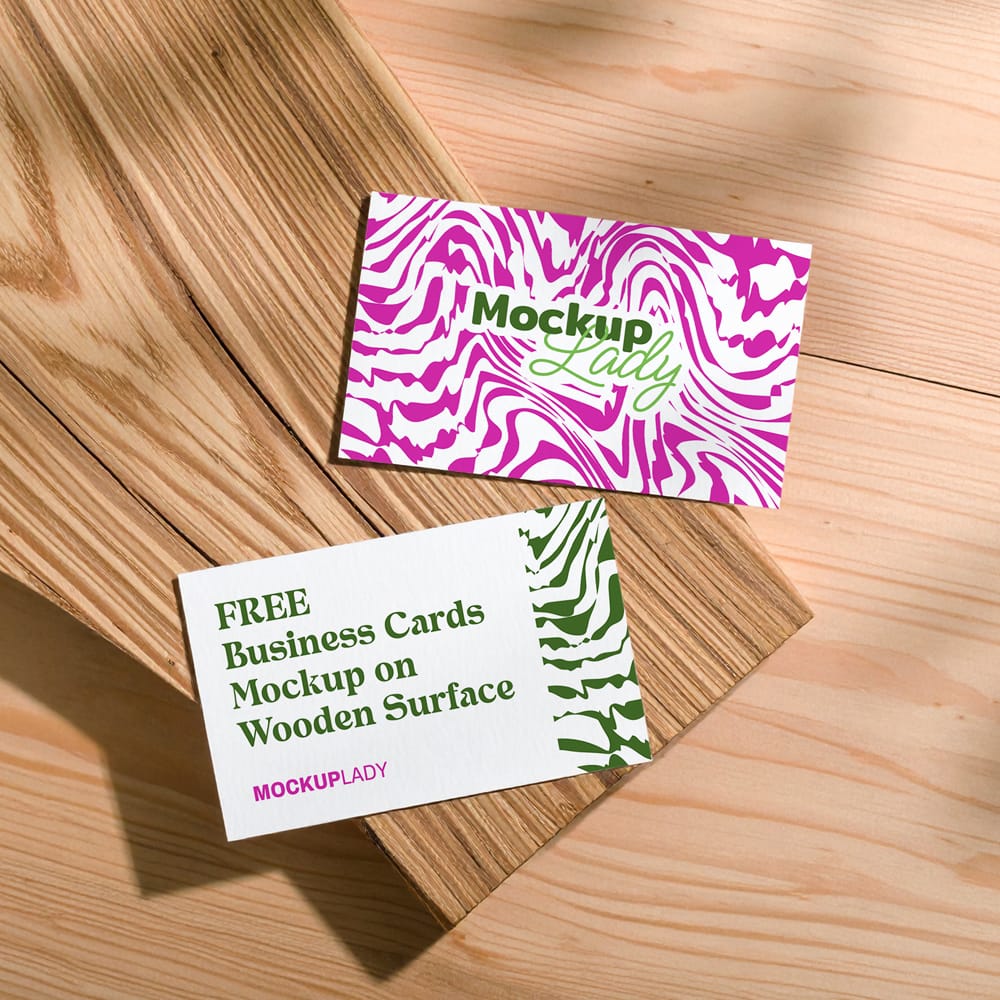 Free Business Cards Mockup on Wooden Surface PSD