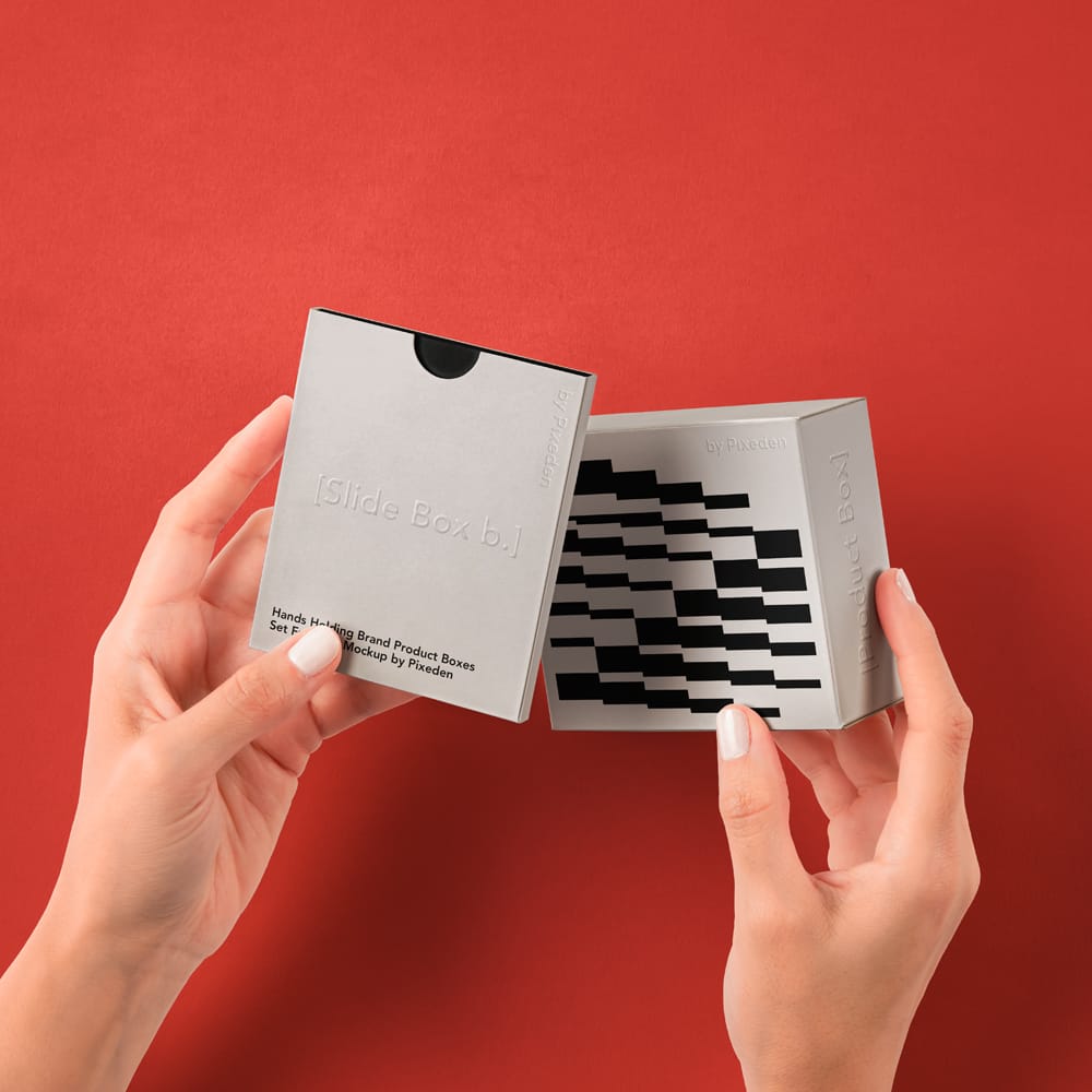 Free Hands Holding Brand Product Boxes Set Mockup PSD