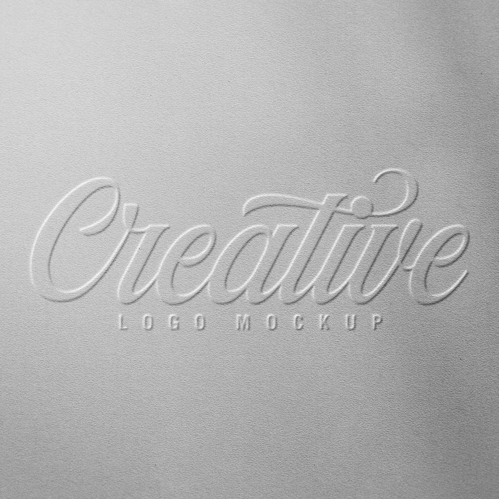 Free Realistic Embossed Logo Mockup Template PSD