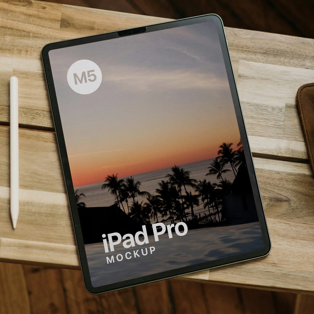 Free Realistic iPad Pro Mockup on a Wooden Desk PSD