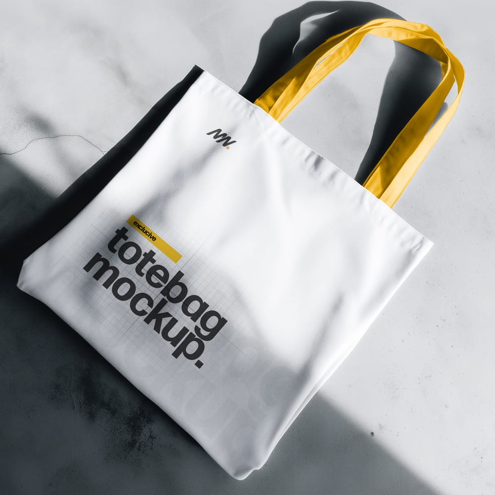 Free Tote Bag Mockup On Concrete Floor PSD