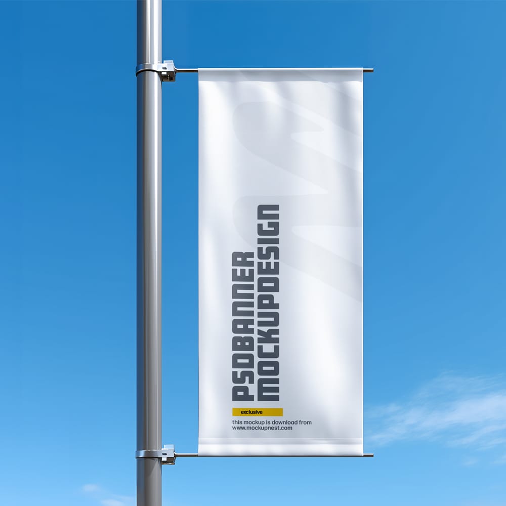 Free Vertical Street Banner Mockup on Pole in Clear Blue Sky PSD
