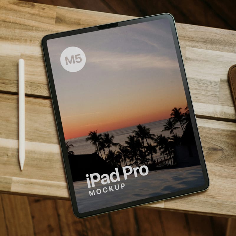 Realistic iPad Pro Mockup on a Wooden Desk PSD