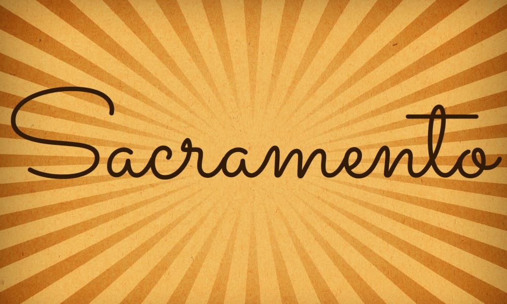 The font Sacramento, a thin, monoline script with a personal touch.