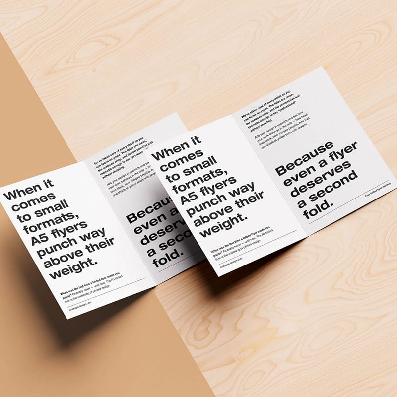 Folded A5 Flyer on Natural Background Mockup PSD