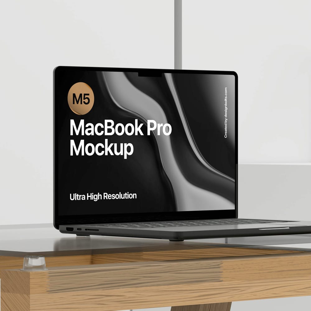 Free M5 MacBook Pro on Table Mockup PSD