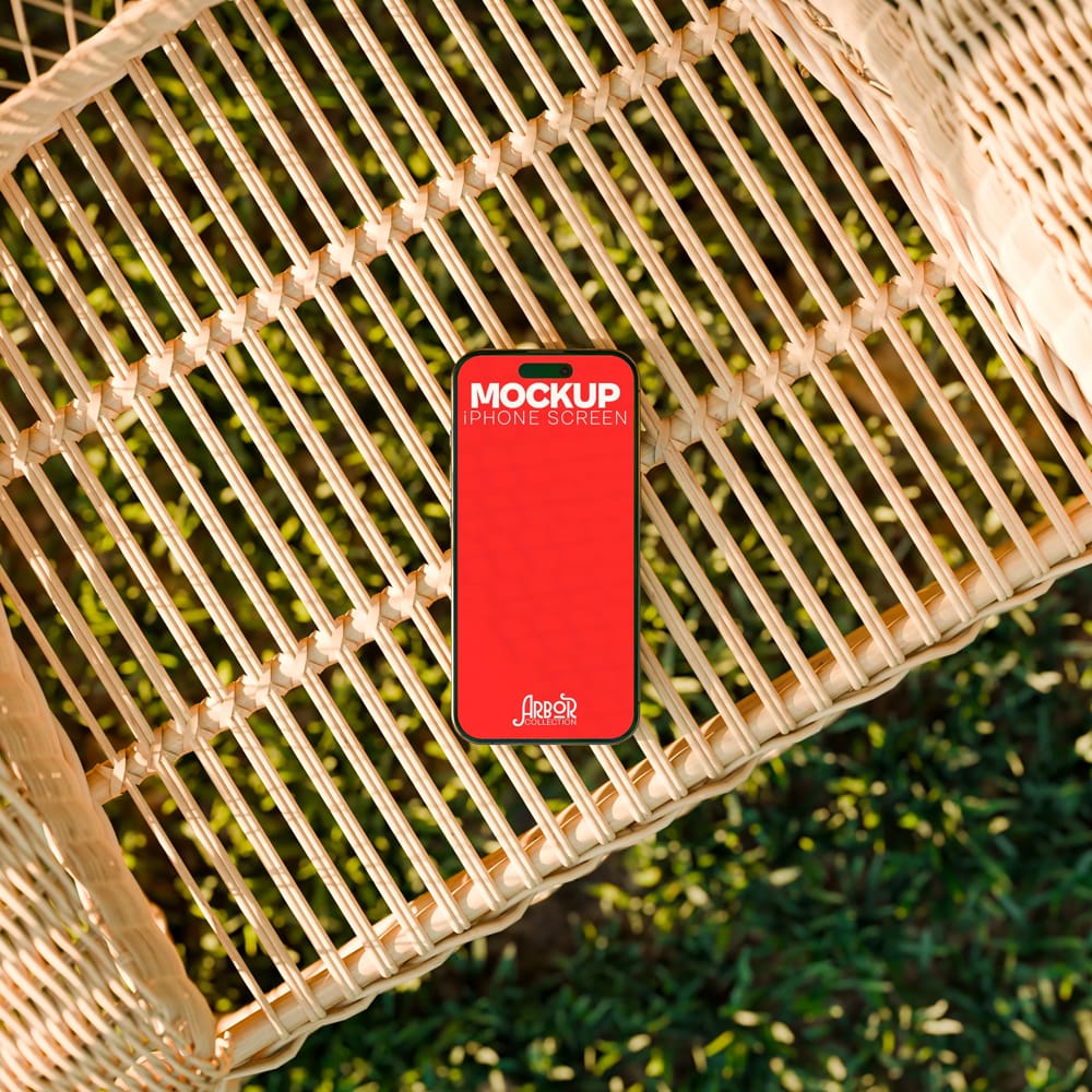 Free Outdoor iPhone Screen Mockup on Wicker Surface PSD