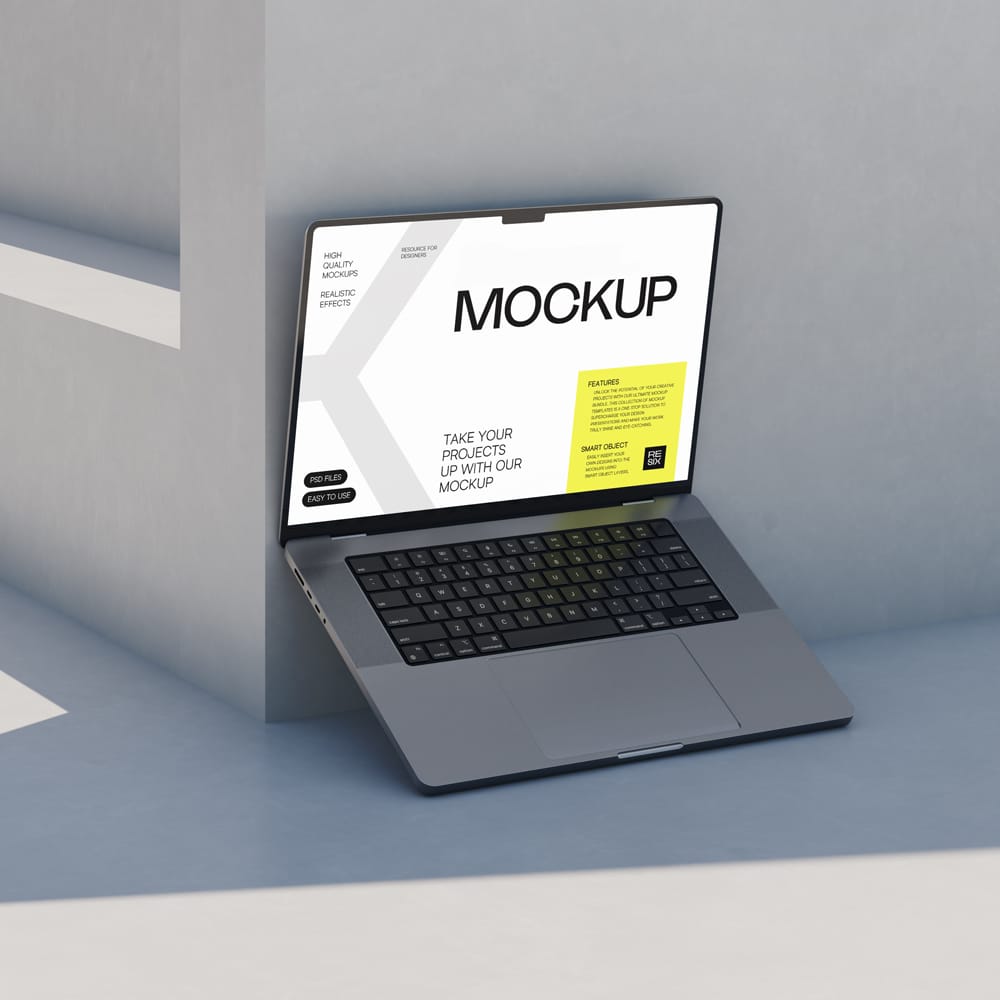 Free Photorealistic MacBook Pro Laptop Mockup PSD