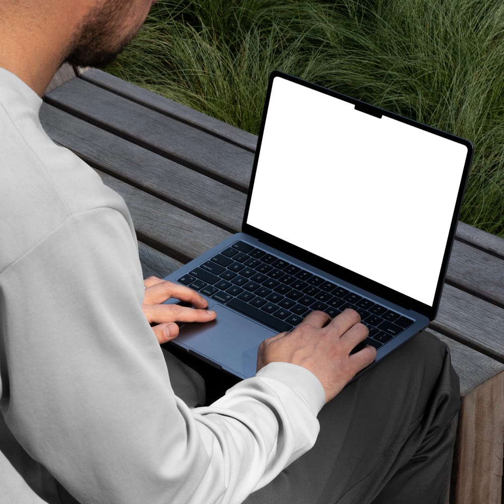 Free Realistic MacBook Display Mockup PSD