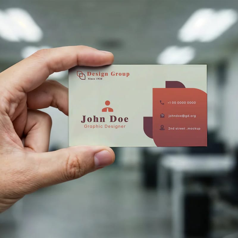 Business Card Held in Hand Mockup PSD