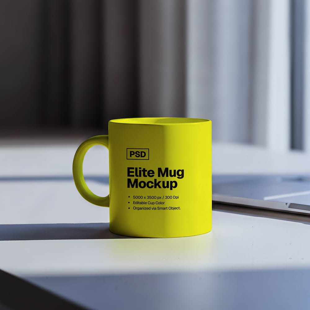 Free Elite Mug Mockup on Desk Scene PSD