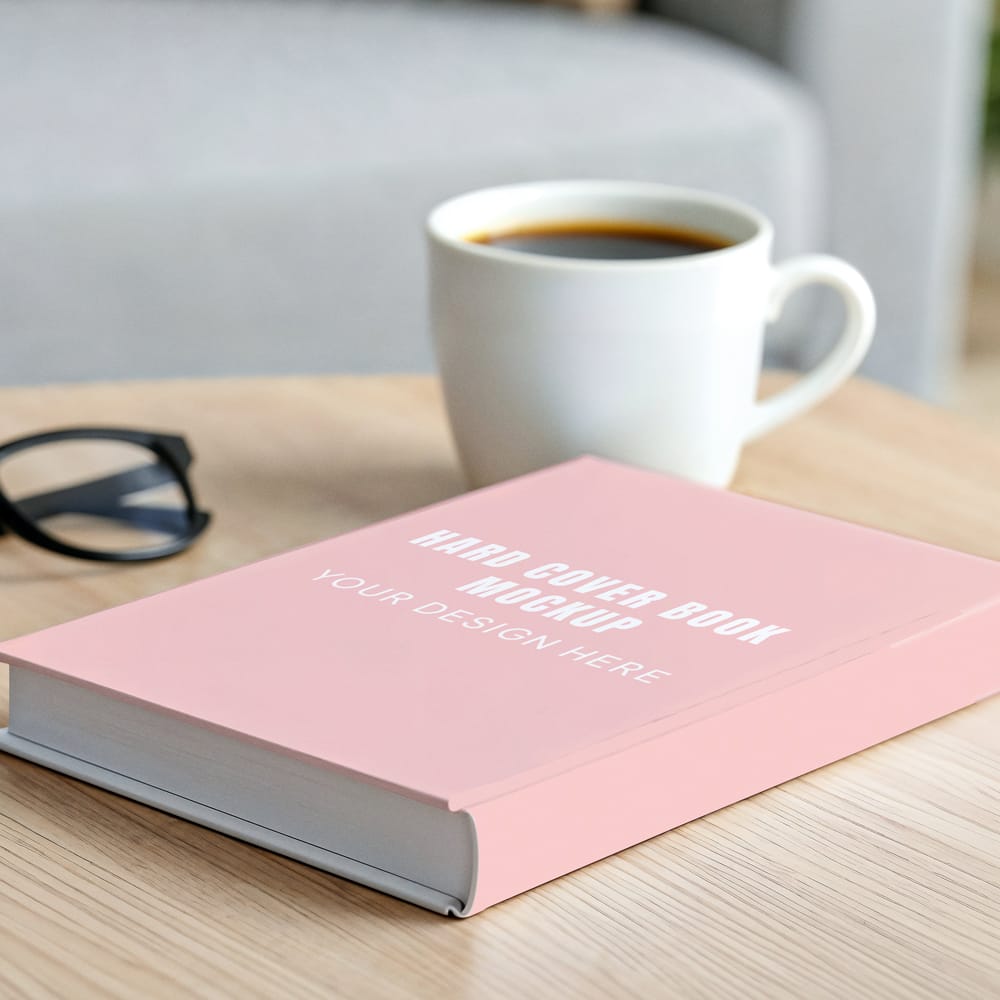 Free Hardcover Book on Table Mockup PSD