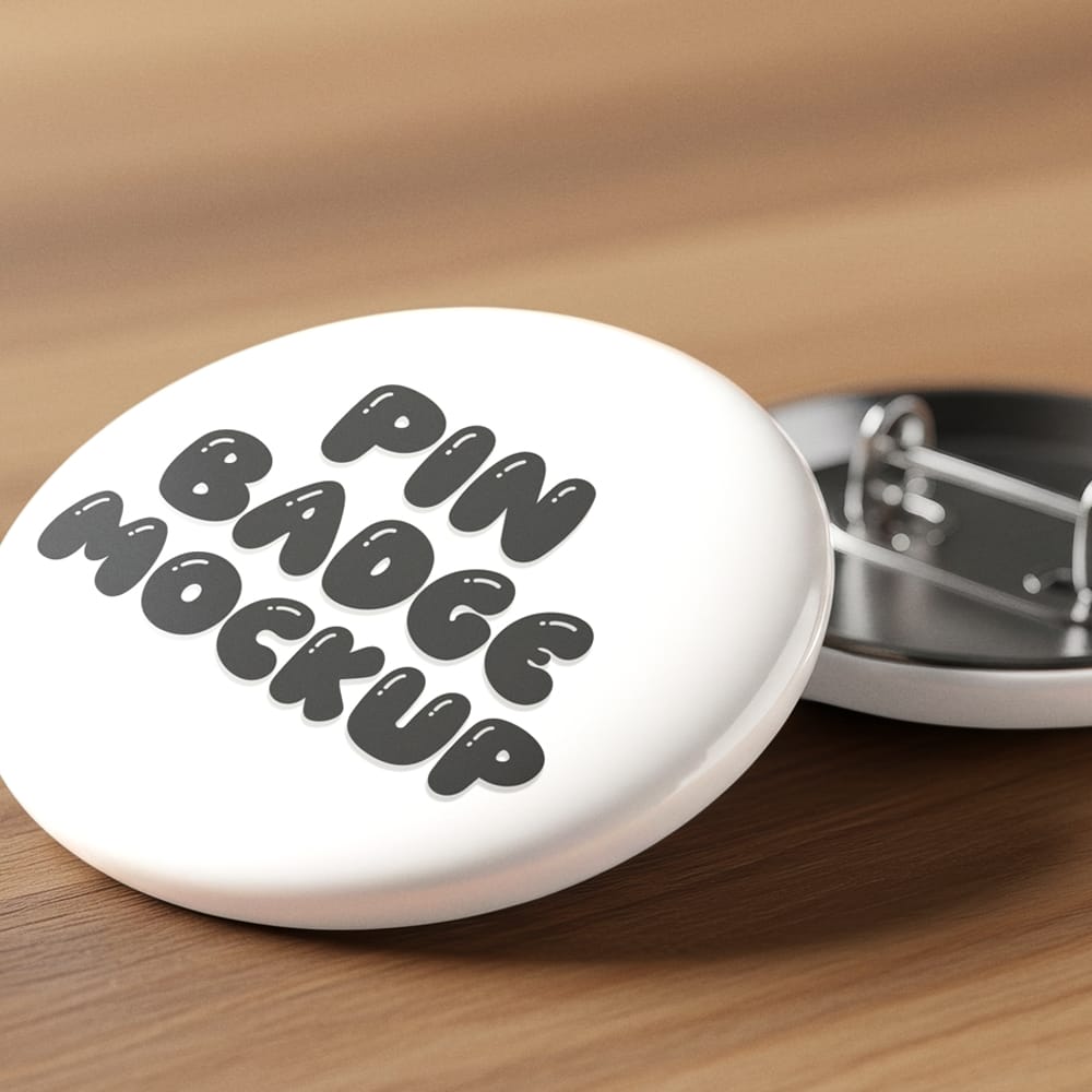 Free Round Pin Badge on Table Mockup PSD