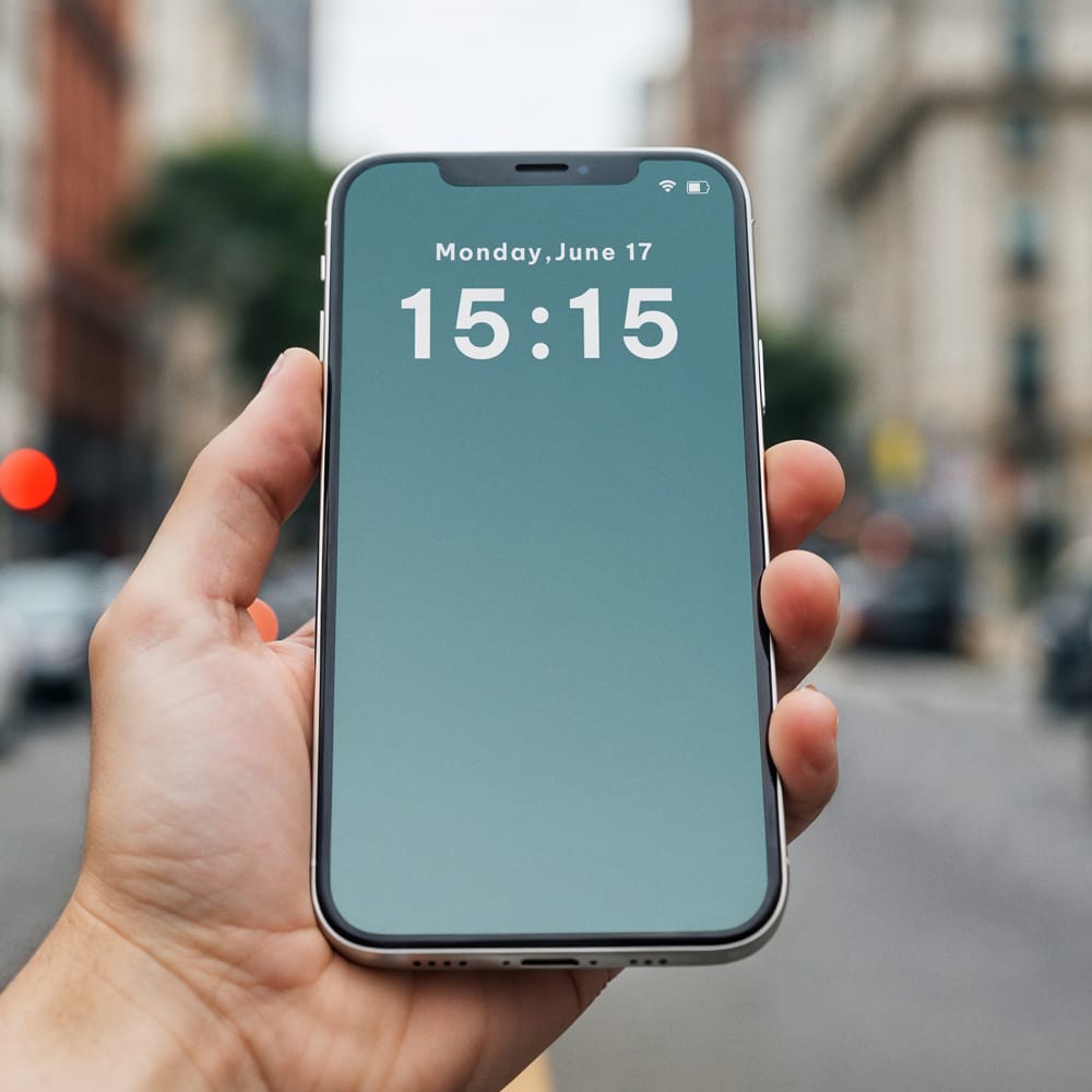 Free Smart Phone in Hand Mockup PSD