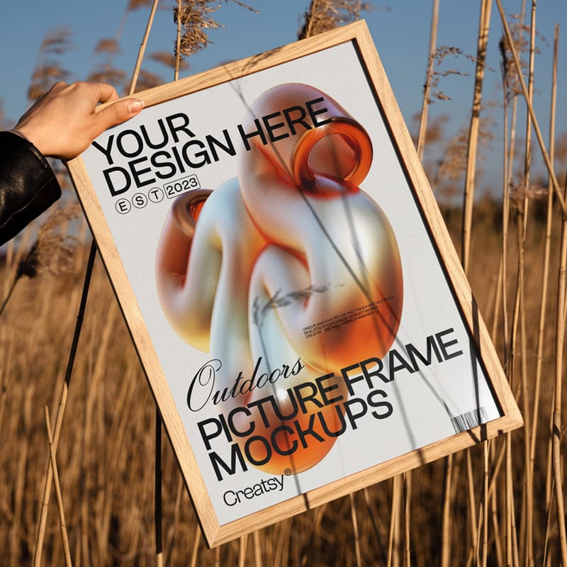 Outdoor Wooden Picture Frame in Tall Grass Mockup PSD